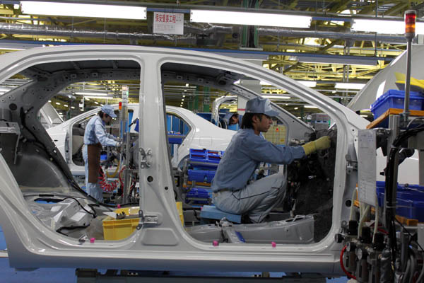 Сборочный конвеер на заводе Toyota Motor Corp., г. Охира, префектура Мияги, Япония (автор Bertel Schmitt)